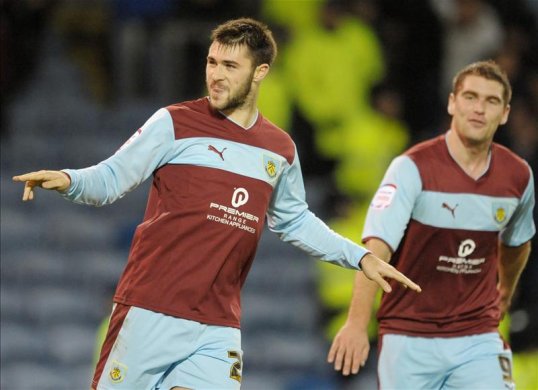 Queens Park Rangers have announced the signing of striker Charlie Austin from fellow Championship side Burnley for an undisclosed fee.