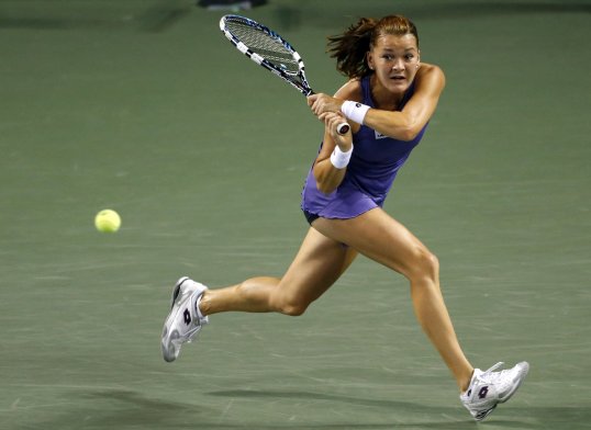 Defending champion Agnieszka Radwanska beat Angelique Kerber to secure her place in the Pan Pacific Open final in Tokyo.