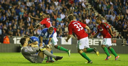 Swansea City defender Angel Rangel praised his side’s character after earning a 3-2 victory over Wigan Athletic and secure a top 10 place in the Premier League at the DW Stadium.