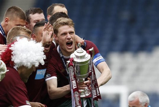Former Hearts captain Marius Zaliukas has joined Rangers on trial as the Ibrox side continues their search for a new central defender.