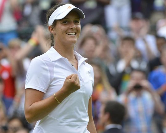 British number one Laura Robson secured a shock 6-3 6-4 win over tenth seed Maria Kirilenko in the first round of Wimbledon.