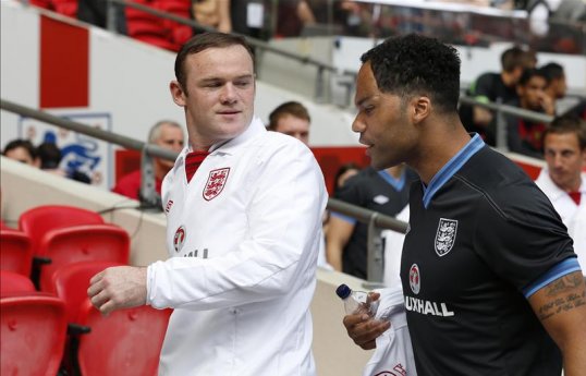 England defender Joleon Lescott believes that his international team-mate Wayne Rooney has matured since his sending off against Montenegro two years ago.