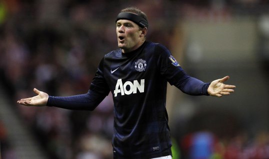 England striker Wayne Rooney turned down the chance to play for Scotland, according to former manager Berti Vogts.