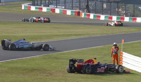 Mercedes driver Nico Rosberg has retired from the Japanese Grand Prix following another error of judgement from Romain Grosjean.