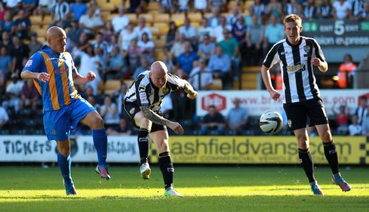Notts County stole three points from Shrewsbury as a late Lee Hughes strike sealed a 3-2 victory.