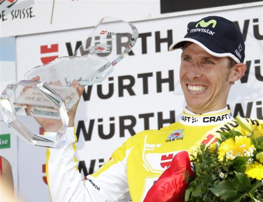 Defending champion Rui Costa has retained his Tour de Suisse title, powering to victory in the race's ultimate uphill time-trial stage.