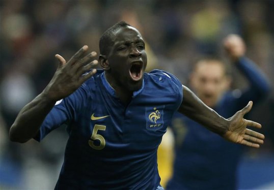 Liverpool's Mamadou Sakho starred as France overcame a two-goal first leg deficit to reach the World Cup with a 3-0 victory over Ukraine at the Stade de France on Tuesday evening.