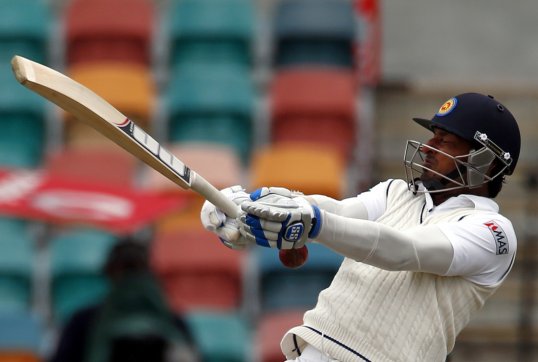 Sri Lanka batsman Kumar Sangakkara became the 11th cricketer to pass 10,000 career Test runs as the tourists collapsed on the opening day of the second Test against Australia in Melbourne.
