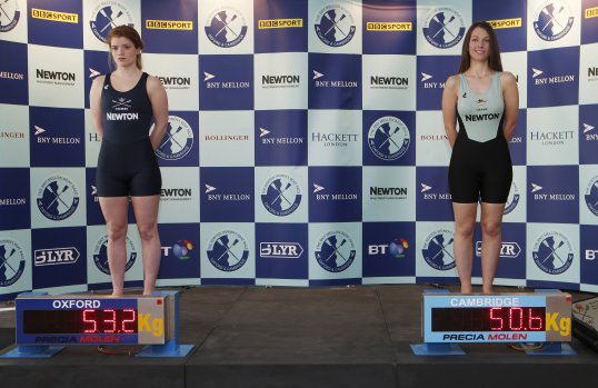 Female rowers in the Oxford and Cambridge Boat Race joined their male counterparts for their first ever public weigh-in.
