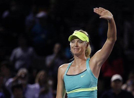 World number two Maria Sharapova eased her way into the third round of the Miami Open after a straight-sets win over Eugenie Bouchard.