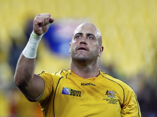 Veteran lock Nathan Sharpe has delayed his retirement to make himself available for Australia's northern hemisphere tour next month.