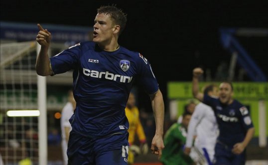 Oldham Athletic's FA Cup hero Matt Smith is facing a £300 fine for throwing his shirt into the crowd following his injury-time leveller against Everton last weekend.