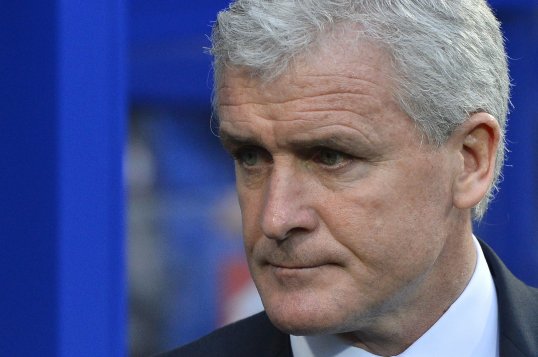 Mark Hughes is facing a fight to solve a dressing-room rift.