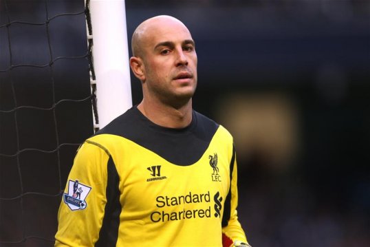 Liverpool keeper Pepe Reina says he is happy at Liverpool and is not paying any attention of rumours linking him with a move away from Anfield.