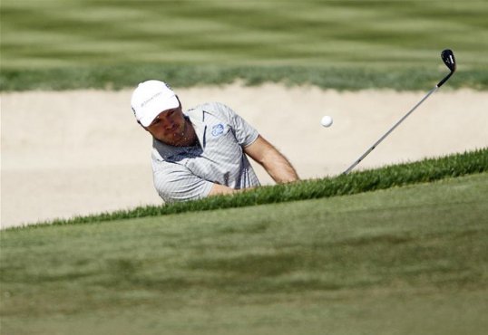 South African Richard Sterne has won the Joburg Open, finishing seven shots ahead of Charl Schwartzel with a tournament record victory of 27 under.