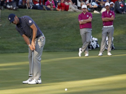 Dustin Johnson and Matt Kuchar win 1 up putting the US side in an even stronger position in the Ryder Cup.