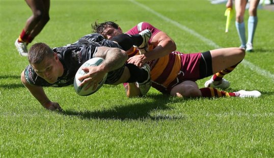 Super League will be cut from 14 teams to 12 from the 2015 season after the clubs agreed a new structure at their annual general meeting.
