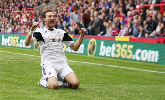 Swansea City's star striker Michu will lead the side's attack in the Premier League game against Arsenal at home.