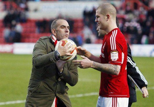 Paolo Di Canio has reached an out of court settlement with Swindon Town after he accused them of breach of contract.