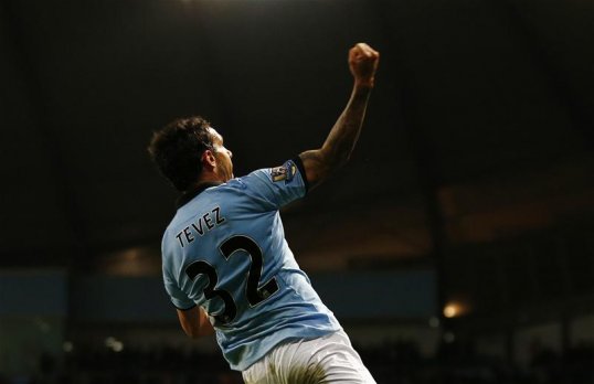 Juventus striker Carlos Tevez says he is delighted with his move away from Manchester City in order to fulfill personal targets.