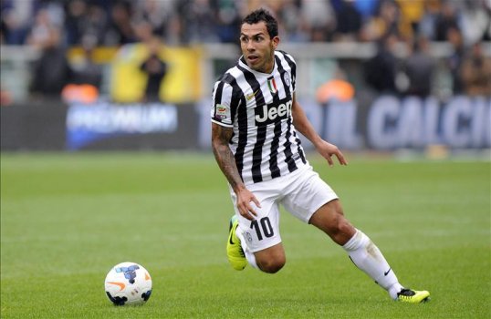 Juventus striker Carlos Tevez has compared his manager Antonio Conte to former Manchester United boss Sir Alex Ferguson.
