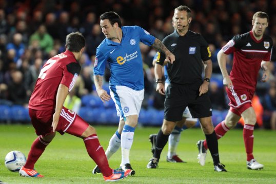 Peterborough United striker Lee Tomlin has had his red card appeal upheld, meaning he will serve out a three-match ban.