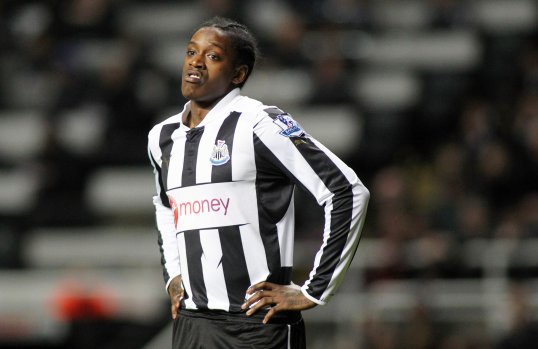 Swindon Town have signed former Newcastle United striker Nile Ranger on a one-year deal.