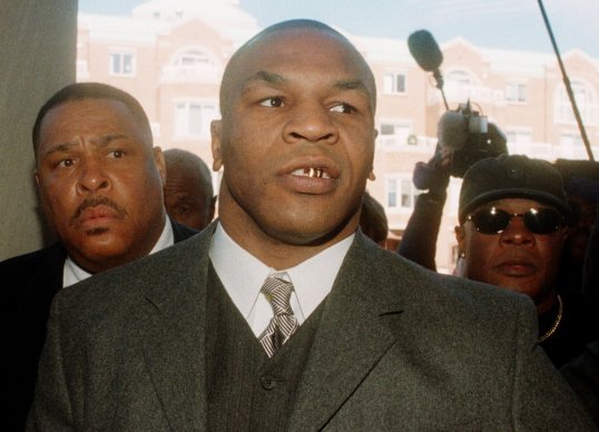The former undisputed heavyweight champion and convicted rapist Mike Tyson has had his visa to New Zealand revoked after a charity withdrew its support.