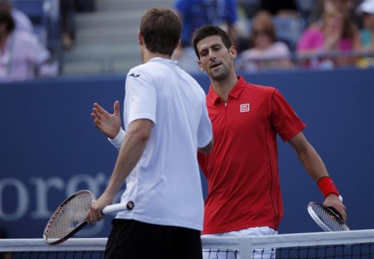 Novak Djokovic is through to the quarter finals of the US Open after blitzing Marcel Granollers.