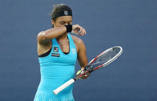 Heather Watson became the first Briton to be eliminated from the US Open after a round one loss to 21st seed Simona Halep.