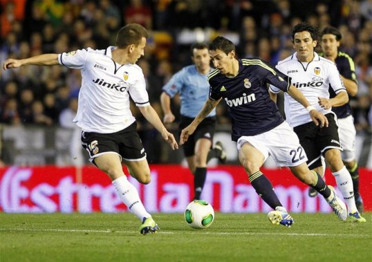 Real Madrid went through to the next stage of the Copa del Rey with nine men at the end thanks to a 2-0 advantage in the first leg.