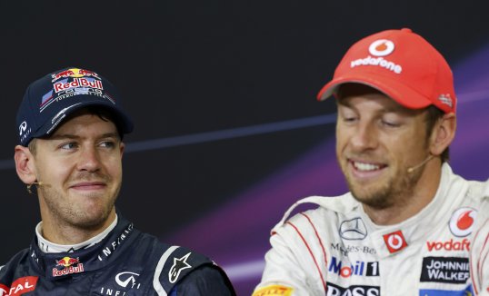 Red Bull driver Sebastian Vettel has been reprimanded for impeding Fernando Alonso during the final qualifying session of the Japan Grand Prix but will remain in pole position.