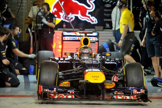 Red Bull's Sebastian Vettel has been demoted to the back of the grid for Sunday's Abu Dhabi Grand Prix.