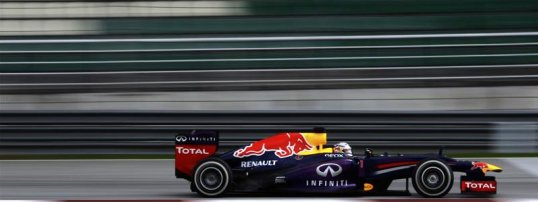 The Red Bull of Sebastian Vettel was the first man in the pits to change to the medium compound dry tyres.
