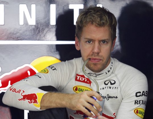 Sebastian Vettel and Mark Webber held off the challenge of Mercedes and Lotus to seal a Red Bull one-two in the opening practice session ahead of the Indian Grand Prix.