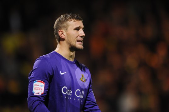 Watford have signed goalkeeper Gary Woods on a one-year contract.
