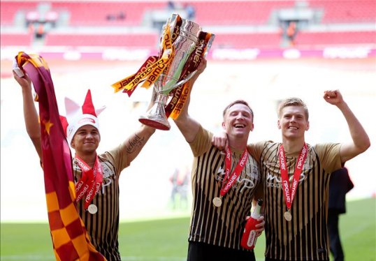 Bradford City striker Nahki Wells has said that his future lies with the Bantems after helping his side secure promotion to League One.