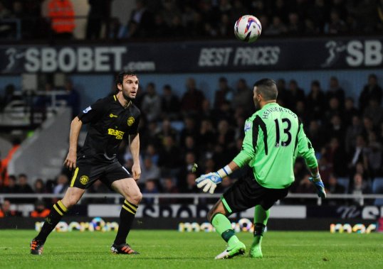 Two goals from Mauro Boselli helped Wigan defeat side West Ham to win their League Cup tie at Upton Park.