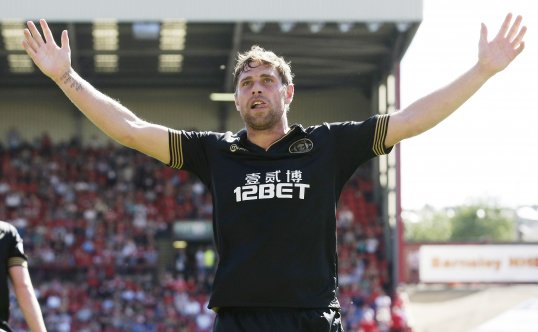 Grant Holt believes Wigan Athletic can beat Premier League champions Manchester United and win the Community Shield this weekend.