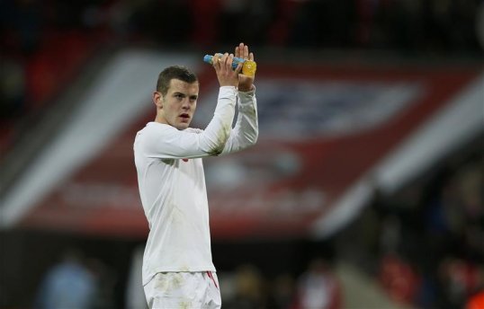 England midfielder Jack Wilshere has said that he is enjoying the atmosphere in the camp under manager Roy Hodgson more than the one during former boss Fabio Capello’s reign.