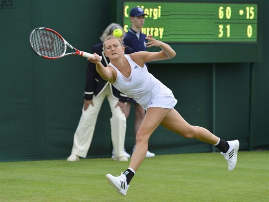 British number seven Samantha Murray was knocked out of Wimbledon in the first round after losing 6-3 6-4 to Camila Giorgi.