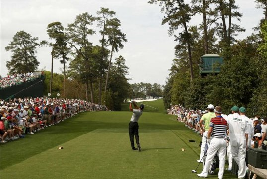Tiger Woods was happy with his solid start at the Masters tournament where he finished on two-under in round one.