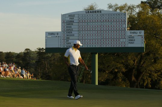 Tiger Woods will remain in the Masters despite controversy over an alleged illegal drop.
