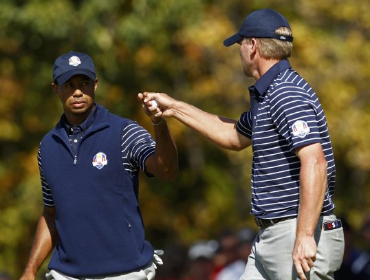 Tiger Woods is struggling today as he missed a short putt on the ninth, putting the European pair of Sergio Garcia and Luke Donald four up at the turn.