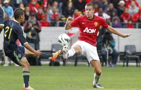 Manchester United's young defender Scott Wootton has been selected for the side's Champions League clash against CFR Cluj tomorrow.