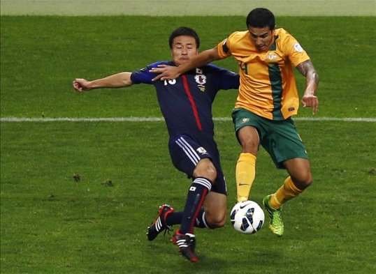 Japan secured their place at the 2014 World Cup with a dramatic last-minute penalty courtesy of Keisuke Honda.