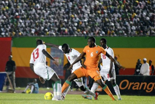 Manchester City midfielder Yaya Toure will head for the African Cup of Nations in January despite almost losing his life in last weekend's match against Senegal.