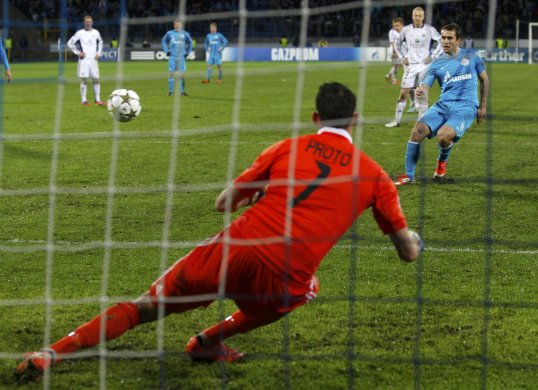 Zenit St Petersburg snatched their first points of the Champions League from the penalty spot in a 1-0 win over Anderlecht.