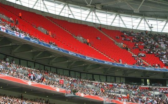 The Football Association has taken the unusual step of opening a neutral zone at Wembley after Wigan Athletic failed to sell 10,000 tickets for their FA Cup semi-final clash with Millwall.